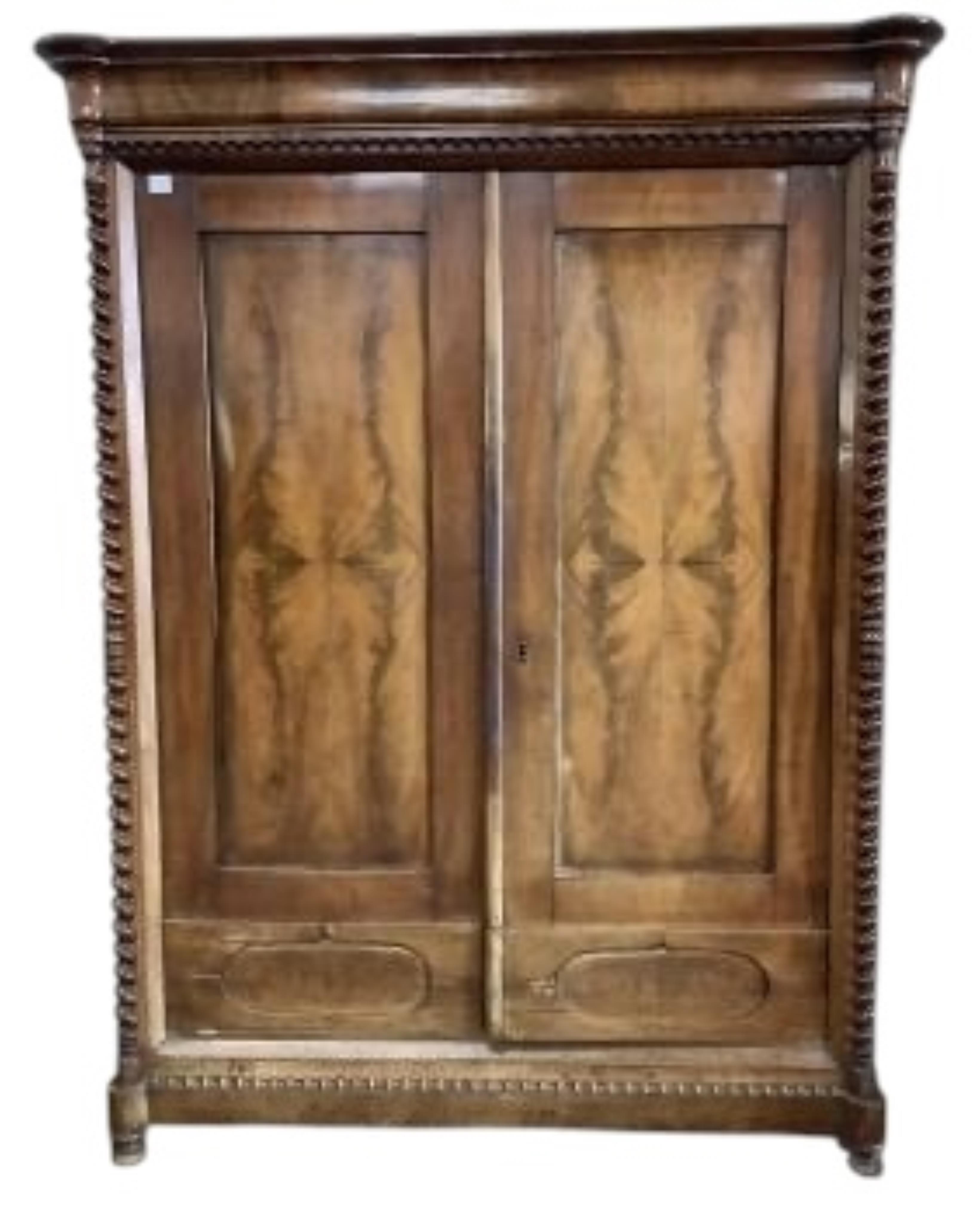 A 19th century Continental mahogany wardrobe, width 160cm, depth 65cm, height 210cm